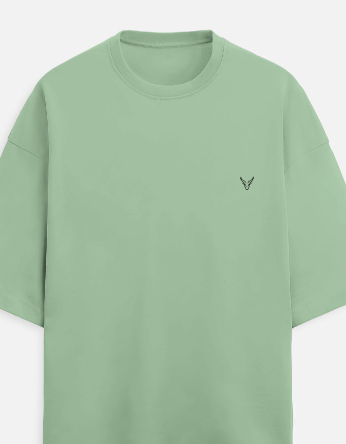 The Zoul sage green oversized terry t-shirt with a minimalist embroidered logo on the chest